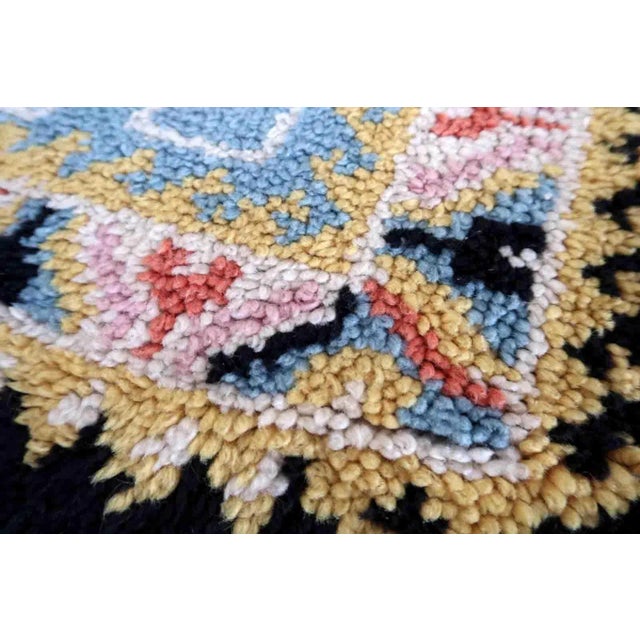 Vintage French Savonnerie rug in sky blue color. The rug has been made in wool in the end of 20th century. It is in...