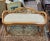 Fine carved French style occasional bench. Features a highly carved wood frame, white of white clean upholstery, wide...