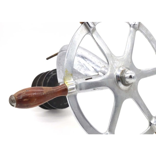 Early 20th Century nickel plated six spoke brass and iron yacht wheel with teak handles in good condition, showing only...