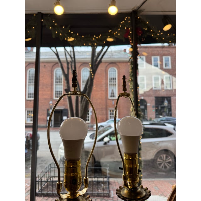 This is a pair of vintage patinated gilt bronze and brass urn shape lamps. They have fabulous intricate details. They...