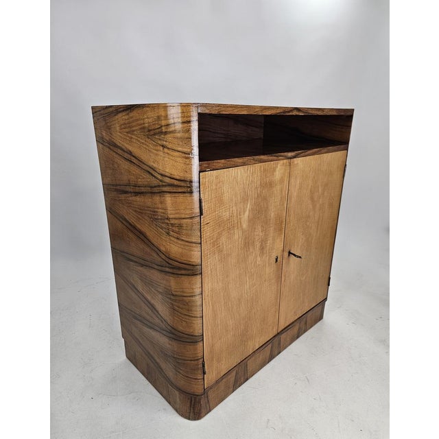 Beatuifull classic yet modern cabinet made of wood. Good overall condition. Some wear, scratches according to its age.