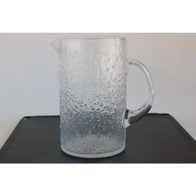 Produced from 1969-80, this fabulous Finnish cocktail pitcher was designedby Tapio Wrikkala and features a textured...