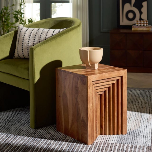 Introducing the Amabu Accent Table in a stunning walnut finish. This elegant piece is crafted from solid wood, offering a...