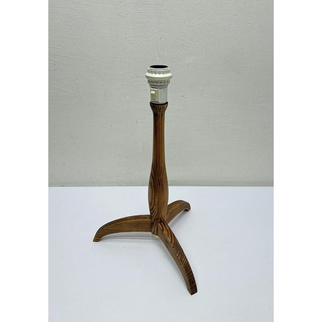 An unusual and early tripod table lamp by Ikea (presumably 1970s) . Superb minimalist design, made of pine with a...