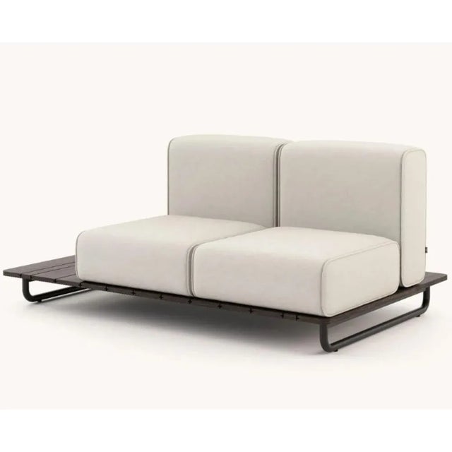 Copacabana sofa without Armrest by Domkapa Materials: black texturized steel, bamboo wood, fabric (Rhine Ice). Dimensions:...