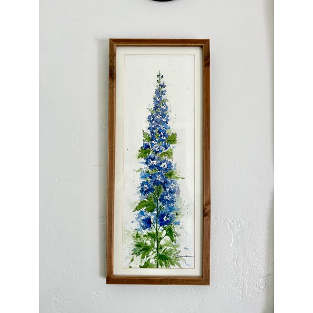 Original watercolor and India ink painting of a delphinium on my flower farm. The painting is Approximately 8 x 22 inches....