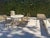 A refined outdoor dining table from Michael Taylor Designs, combining classical proportions with a robust architectural...