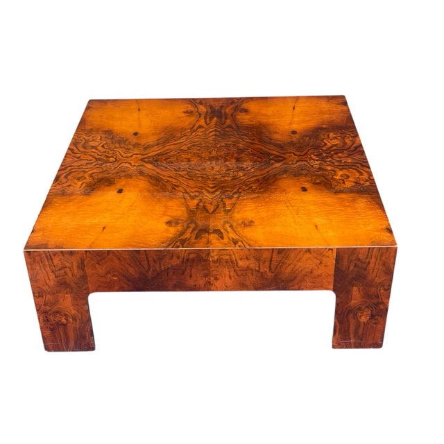 Striking vintage waterfall coffee table crafted in richly figured burl wood veneer. This sculptural piece features a...