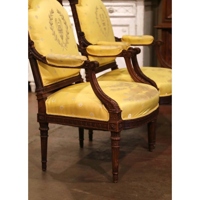 Yellow Pair of 19th Century French Louis XVI Walnut Fauteuils With Eagle Crest For Sale - Image 8 of 10