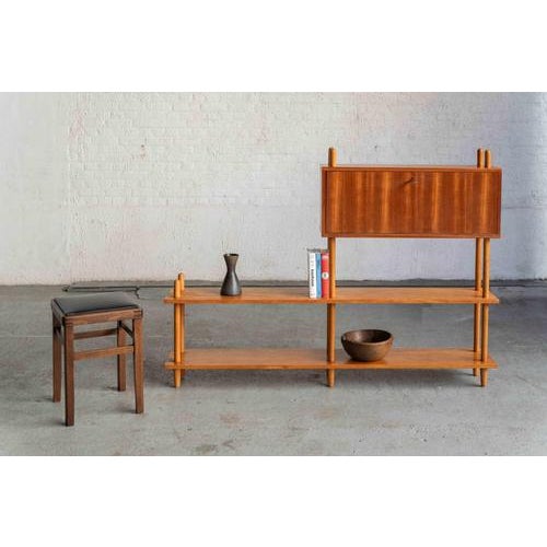 Shelving unit, designed by Willem Lutjens and produced by Gouda den Boer in the Netherlands during the 1950’s. The system...