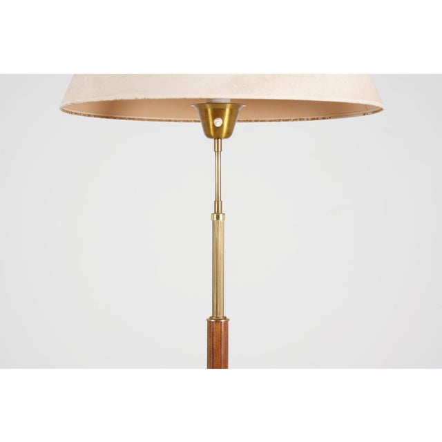Swedish Floor Lamp in Brass and Wood from AB Armaturhantverk, 1950, in Very Good conditions. Designed 1950 to 1959 This...