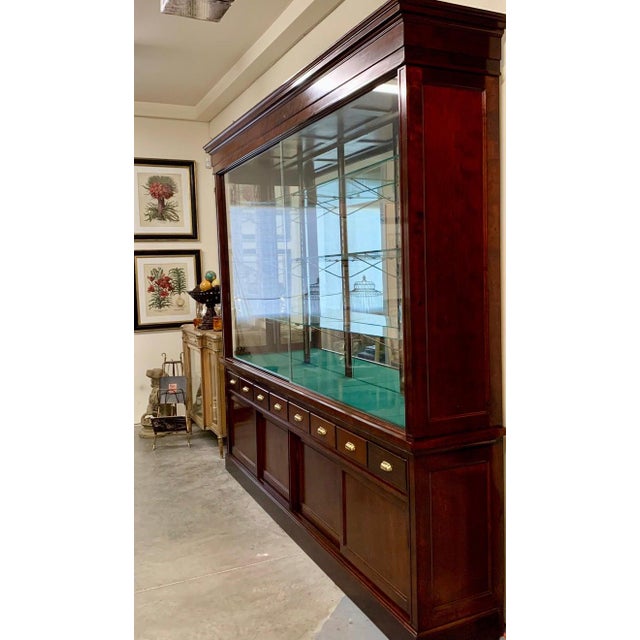 Large mahogany display cabinet made by the Joslin Showcase Company of Boston, Massachusetts. The company was founded in...