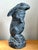 This vintage cast ecoplaster rabbit sculpture is a delightful example of mid-century decorative art, blending whimsical...