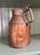 Lovely hand made copper and brass vessel with handle and bird detail. Wonderful patina and perfectly rustic, this piece...