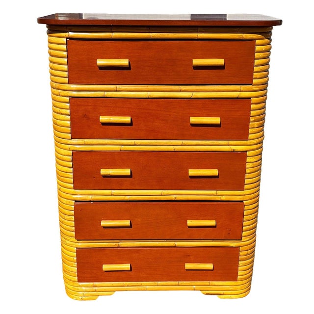 This beautifully restored coastal Art Deco era rattan chest of drawers with a mahogany top and five pull-out mahogany...