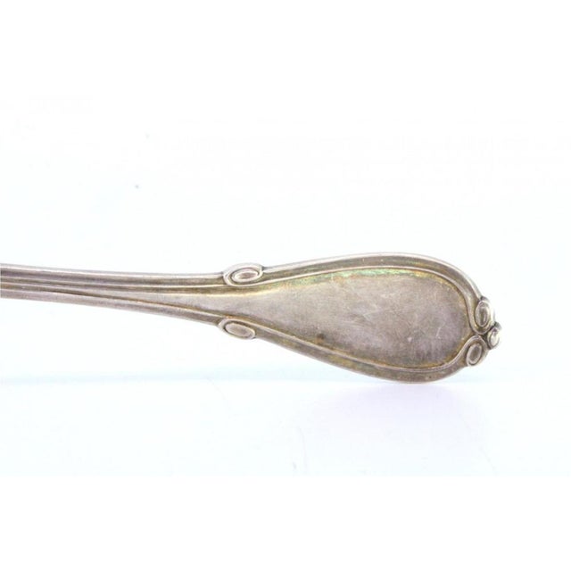 Silver Dusting Spoon with Raised Handle Frieze, in Very Good conditions. Designed before 1890 This piece has an...