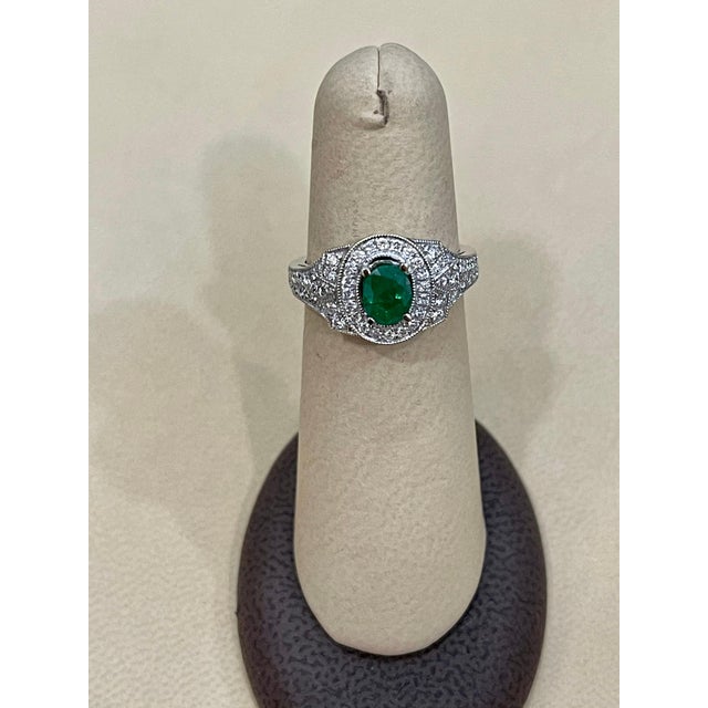 0.80 Carat Oval Cut Emerald and 0.85 Carat Diamond Ring 18 Karat White Gold For Sale - Image 13 of 18