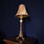 Striking vintage table lamp with an ornate Hollywood Regency / Neoclassical Revival design, combining sculptural...