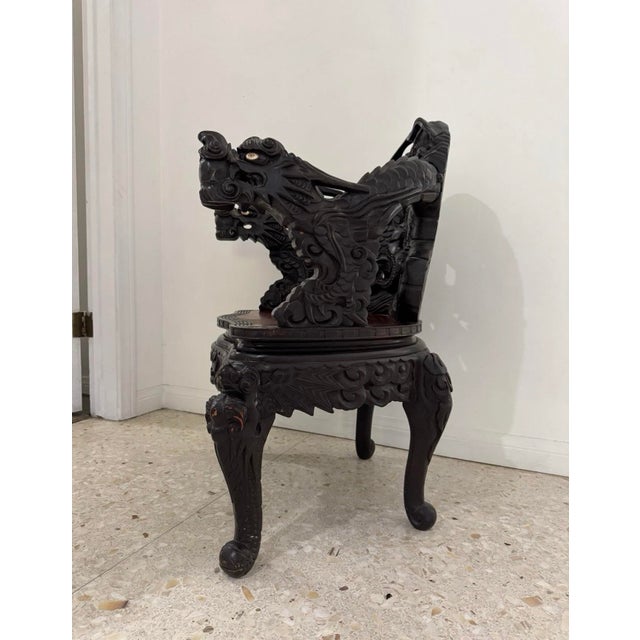 An extraordinary Japanese Meiji-era export armchair (c.1900), intricately carved from solid sugi (K, Japanese cedar) in...