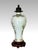 An exceptional Chinese Famille Rose crisp white porcelain Mei Ping (Baluster) Vase presented on a hand carved rosewood...