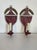 Pair of Tole Sconces Pair of painted tole sconces depicting marbled urns, in dark rouge red color with painted gilt...