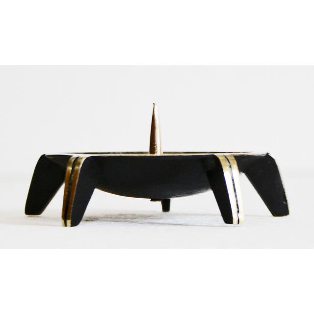 Rohac Candlestick Candlestick made around 1950. Richard Rohac (1906 – 1956). Brass, black patinated, polished on the...