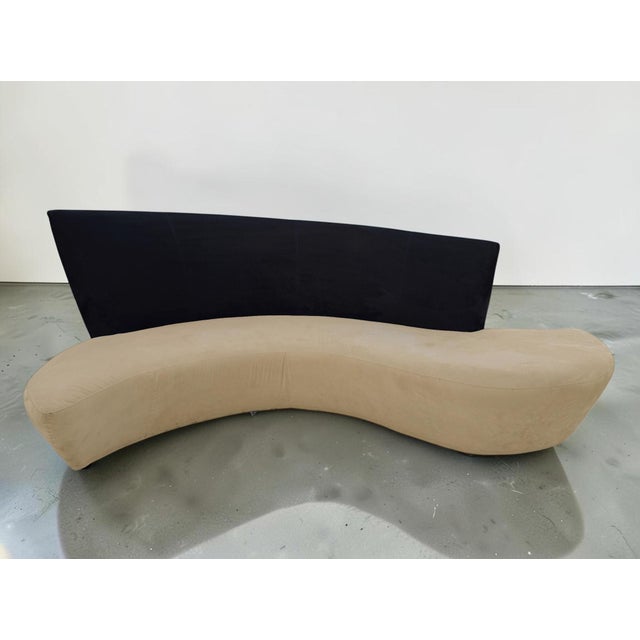 Vladimir Kagan Serpentine curved sofa in a really striking two-tone navy blue and soft cream velvet. This is one of those...