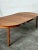 Extendable dining table, made of light hazelnut teak wood, the prestigious Danish manufacturer Gudme, was one of the...
