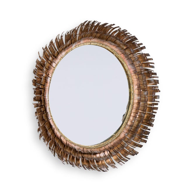 Curtis Jere Mid Century Brutalist Copper and Brass Eyelash Mirror This mirror measures: 29 wide x 4 deep x 29 inches high...