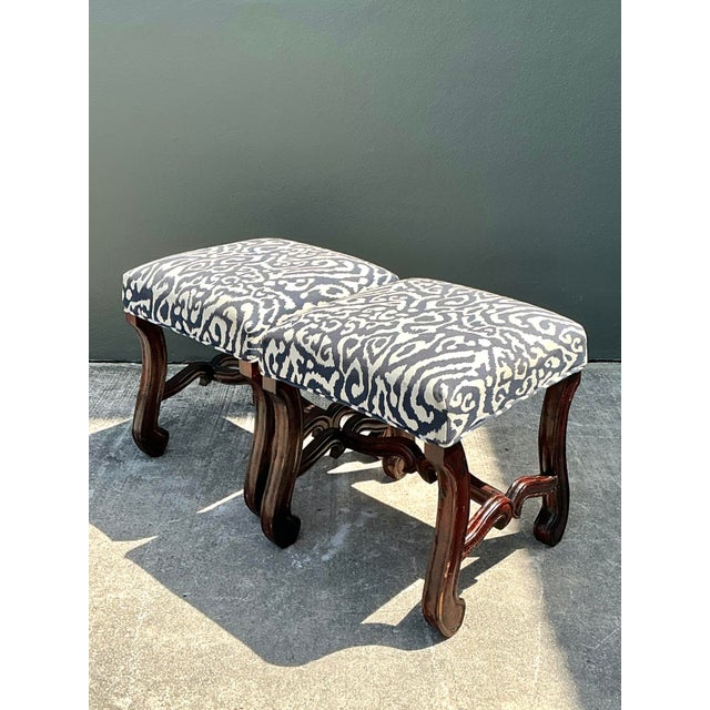 This elegant pair of low stools features beautifully carved wood frames with graceful cabriole legs and decorative...