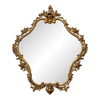 French Rococo-Inspired Gilded Wall Mirror – Ornate Gold Leaf Frame With Floral Details For Sale