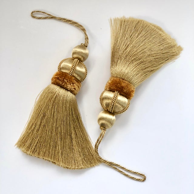 Pair of gold colored key tassels with satin wrapped beads, cut velvet collar, coordinating loop-cord and matching gimp...