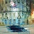 Porto XI by Heiko Mattausch | Oil Painting of a cityscape with blurred buildings and a vehicle For Sale