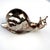 A charming silvertone snail to hold toothpicks or matches. Let this darling little guy complete your table- or mantle-scape.