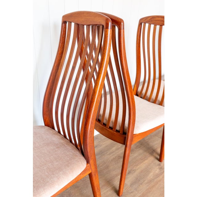 A strikingly impressive and very rare set of six scandinavian mid-century teak dining chairs in lovely vintage condition....