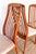 A strikingly impressive and very rare set of six scandinavian mid-century teak dining chairs in lovely vintage condition....