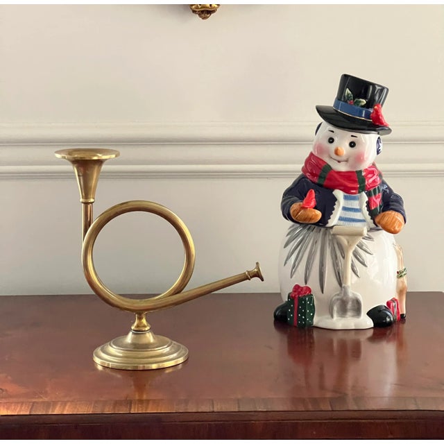 Timeless and classic, this vintage brass French horn is a holiday classic. Use it alone or as part of a brass candle...