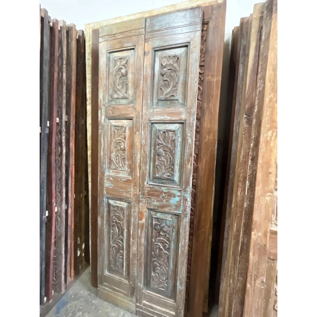 Elevate your interiors with this Antique Carved Double Doors, a stunning example of reclaimed craftsmanship designed for...