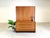 We are offering a beautiful teak bookcase or living room cabinet from WK Möbel for sale. The modules come from a wall...