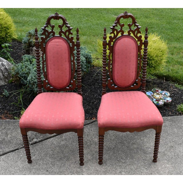 Antique (1880's) Pair of Boudoir Chairs have a Victorian Style. The Frames are Wood. Walnut. Carved Wood - Spindle Sides &...