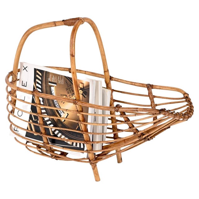 Amazing mid-century French Riviera nest-shaped bamboo and rattan magazine rack. This wonderful piece was probably designed...