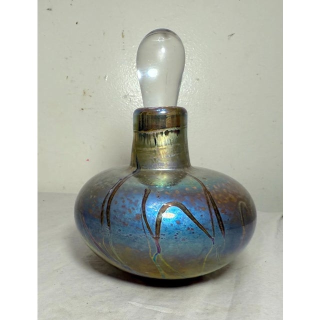 Up for sale is a high quality original hand blown art glass perfume bottle made by Fellerman & Raabe in 1994. The lovely...