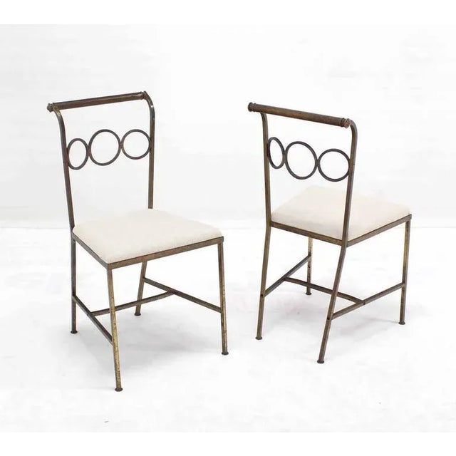Set of rare design brass chairs in style of Jean Royère. Low profile HEAVY brass dining chairs.