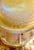 It is crafted from Favrile glass, a signature iridescent art glass patented by Louis Comfort Tiffany in 1894. The vase...