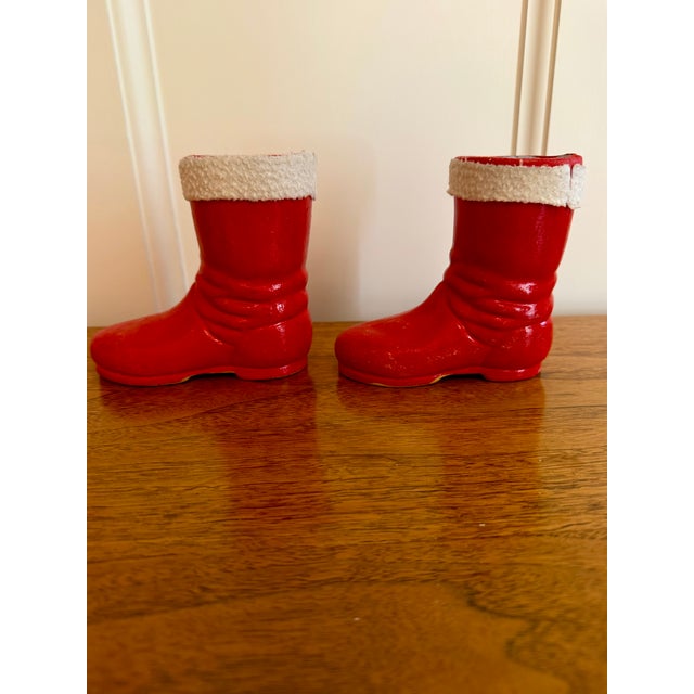 Vintage 1920-30s German Santa boot candy holders for St. Nick's Day. Made of plaster or chalk ware, these boots are...