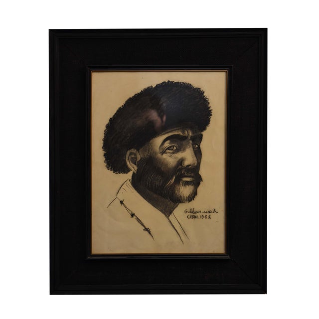 This impactful 21" x 27" charcoal drawing by Ghulam Sedik, created in Kabul in 1969, presents a compelling portrait of an...