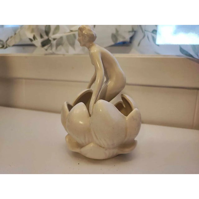 Art deco, porcelain figure, girl in lilac, dimensions: height 15.8 cm, width 10 cm, depth 10 cm.