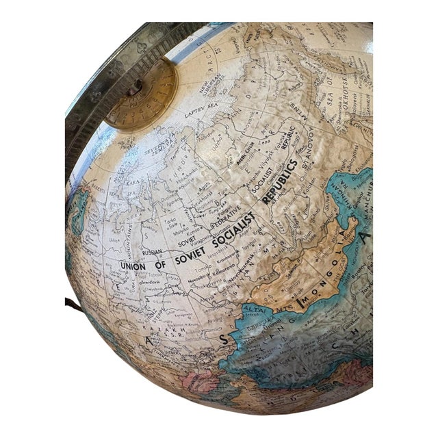 Vintage Replogle World Classic Series Globe, Circa Cold War era due to the U.S.S.R. The globe has an antique ocean map...