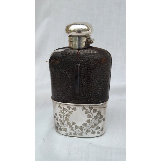 This is a 19th century liquor hip flask with glass and leather. Screw cap is in good order. Perfect for display or for the...