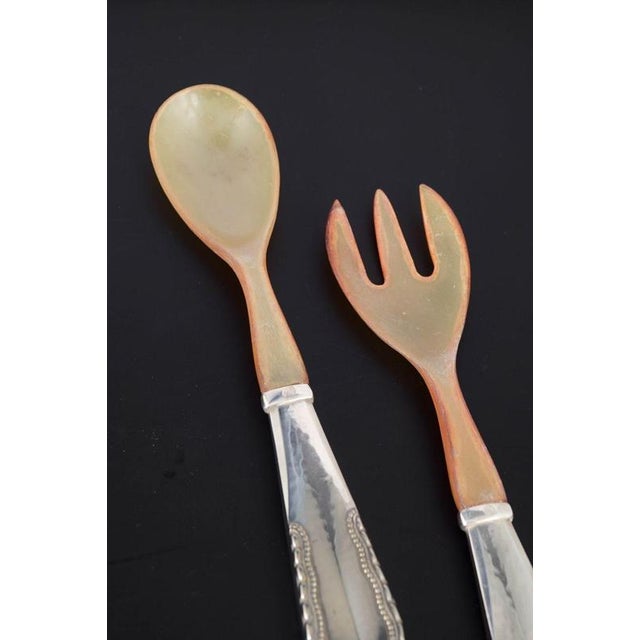 Georg Jensen, salad set Viking. Elegant salad server set in 830 silver and bone, with handles in the Viking pattern. The...